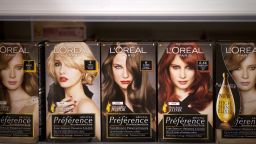 Boxes of hair dye kits, manufactured by L'Oreal SA, sit displayed for sale in a supermarket in Slough, U.K., on Monday, Sept. 3, 2012. U.K. retail same-store sales barely rose in July, according to the British Retail Consortium, as consumer confidence was undermined by the double-dip recession and the euro-area debt crisis. Photographer: Simon Dawson/Bloomberg via Getty Images