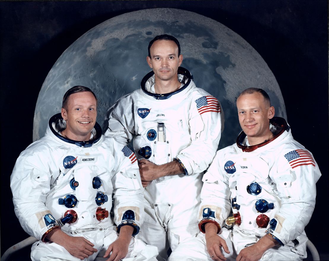 Group portrait of Apollo 11 lunar landing mission astronauts (left to right) Neil Armstrong, Michael Collins and Edwin Aldrin Jr. in spacesuits