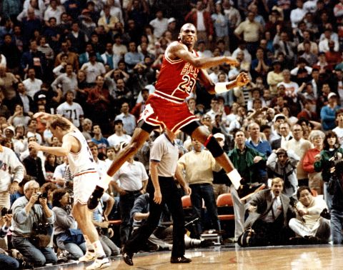 Jordan celebrates after hitting a buzzer-beating basket to knock Cleveland out of the NBA playoffs in 1989. The play became known as "The Shot," and it was remembered for Jordan's fist-pump celebration and the dejection of Cleveland's Craig Ehlo.
