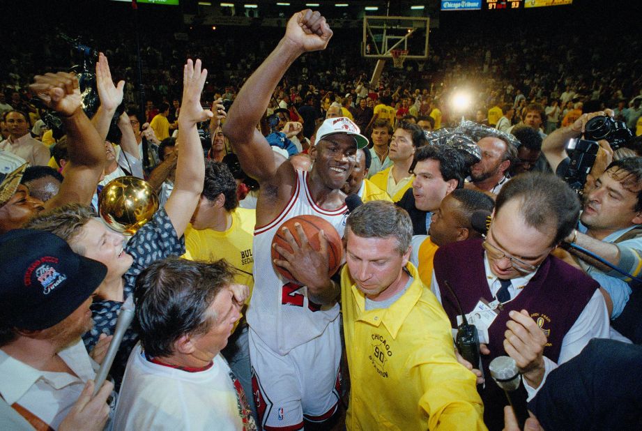 Jordan is surrounded by fans after the Bulls defeated Portland for their second straight title. Jordan was again named Finals MVP. In fact, he was Finals MVP in all six seasons that the Bulls won the title.