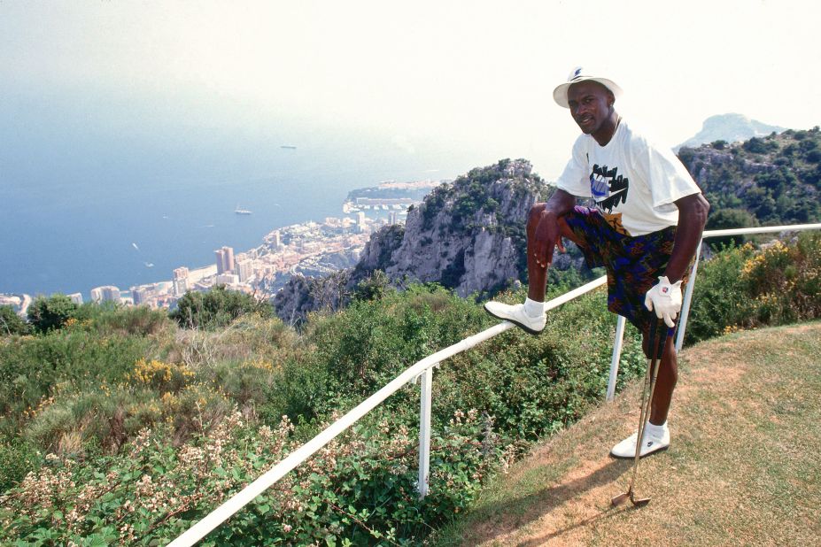 Jordan, decked out in golf gear, poses for a photo during an off-day at the 1992 Summer Olympics. Jordan remains an avid golfer to this day.