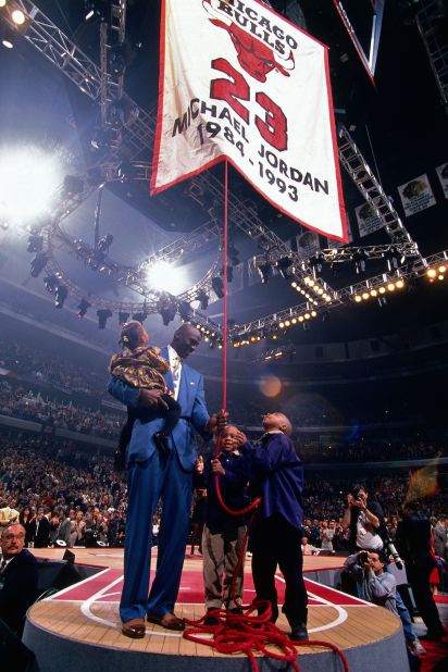 Jordan is joined by his children Jasmine, Marcus and Jeffrey as the Bulls retired his number in 1994.