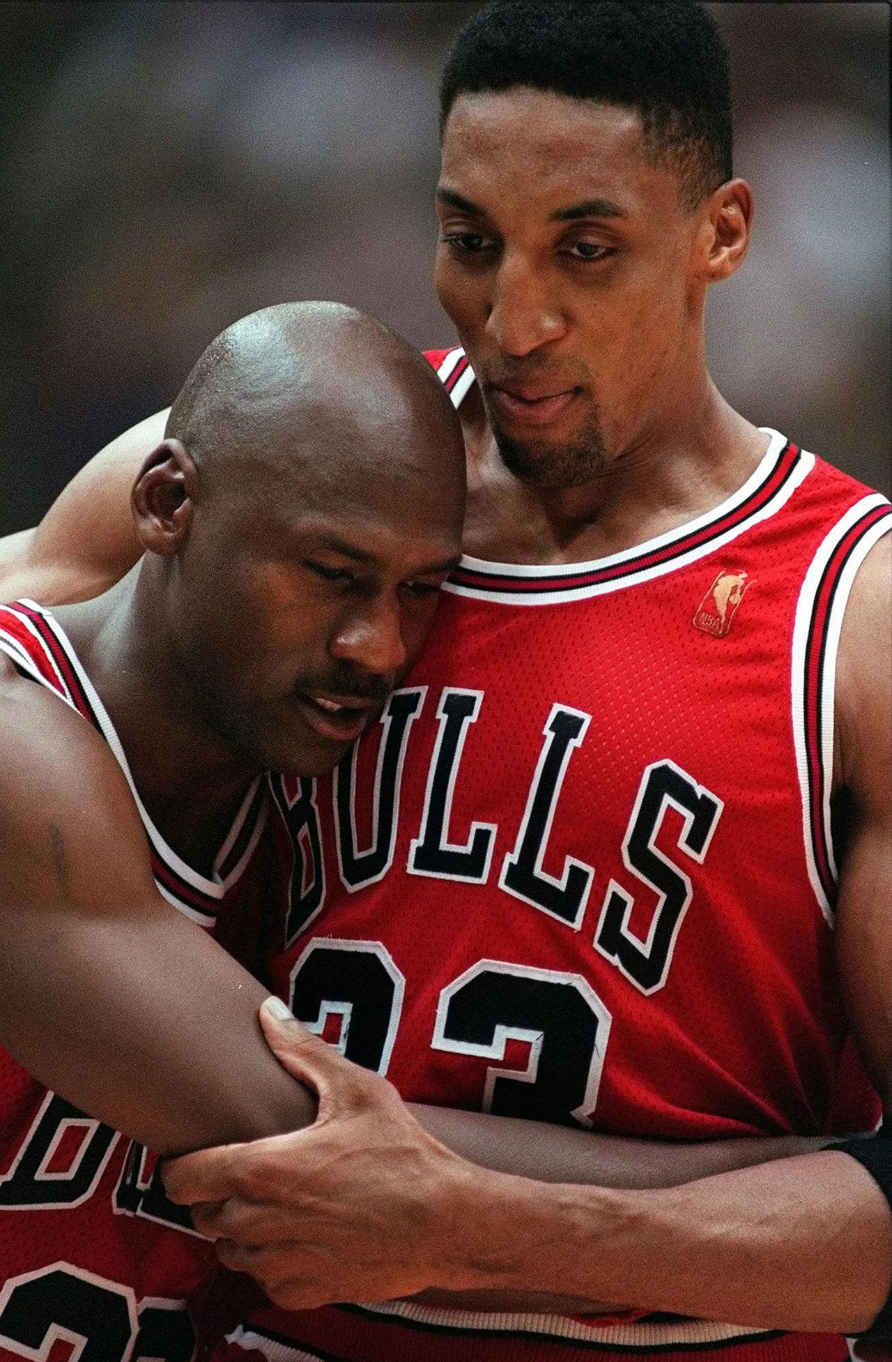 Pippen holds up Jordan during the famous "flu game" in the 1997 NBA Finals. Jordan was battling flu-like symptoms during Game 5, but he still went on to score 38 points and hit the game-winning 3-pointer against the Utah Jazz. (In "The Last Dance," Jordan said it was food poisoning he was suffering from, not the flu.) The Bulls went on to win Game 6 for their second straight title and their fifth of the decade.