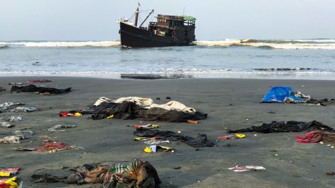 The belongings of Rohingya refugees lie on the shore as their boat remains anchored in Teknaf, Bangladesh, on April 16.
