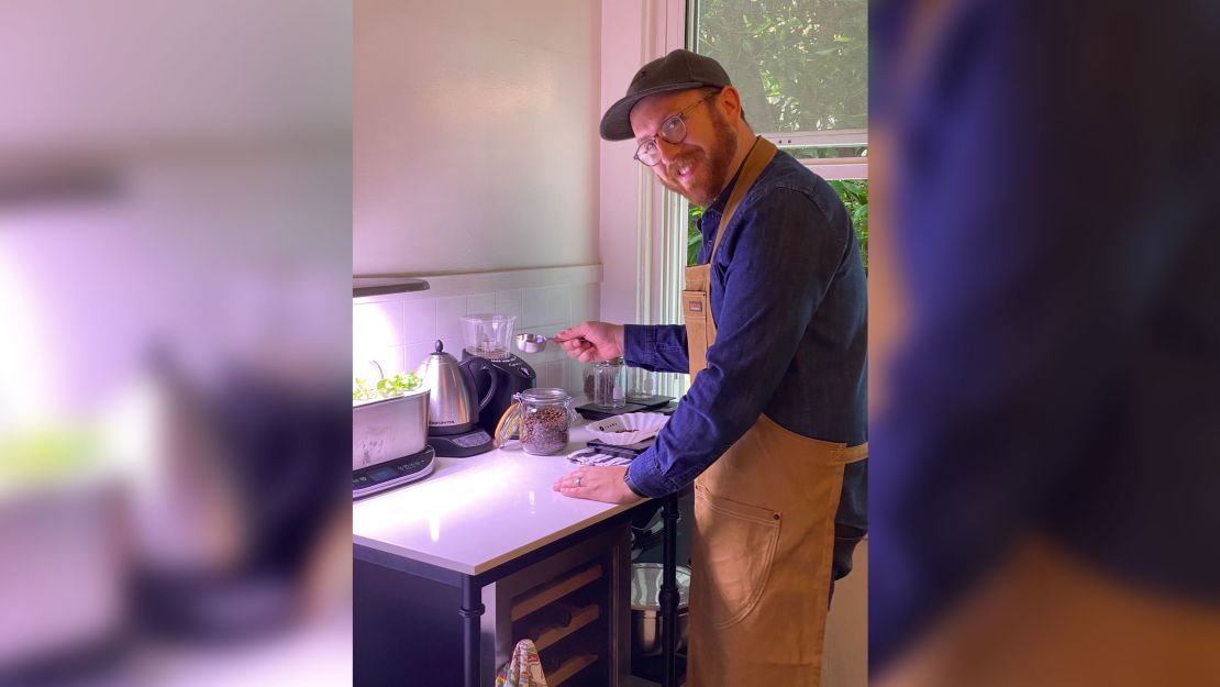 Ben Ramirez brews coffee in the kitchen of his North Beach home.