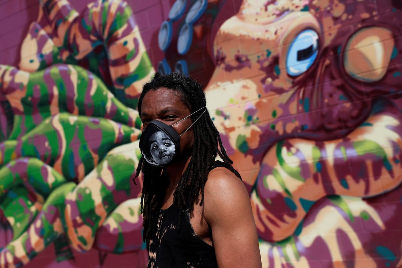 Orlando Baker wears a mask in Fort Collins, Colorado, that he developed using an image from the Notorious B.I.G.'s album "Ready to Die."