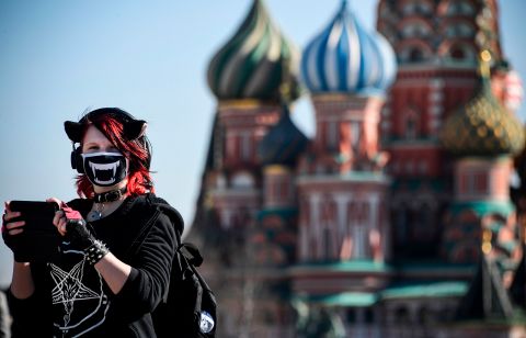 A young woman walks in Moscow's Red Square.