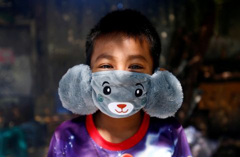 Panji, 8, wears an animal-shaped face mask in Jakarta, Indonesia.