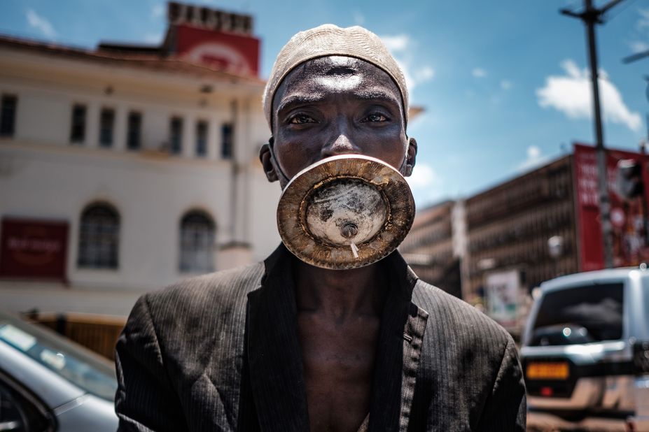 A man poses for a photograph in Kampala, Uganda.