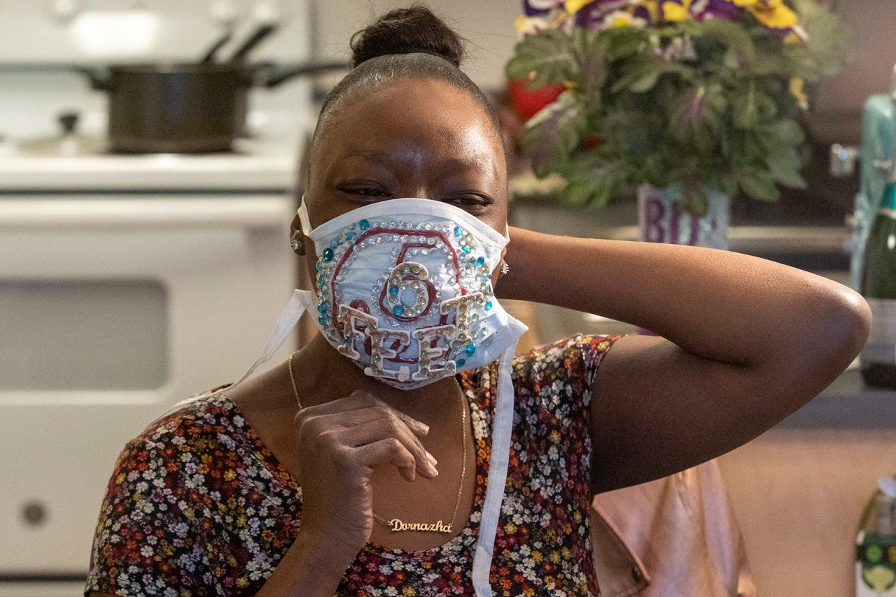 Dornazha Blake wears a festive mask on her mother's birthday in Redwood City, California.