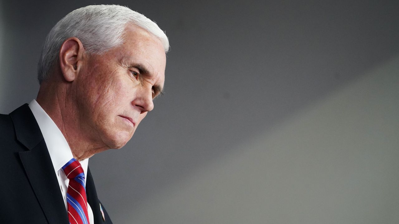 US Vice President Mike Pence takes part of the daily briefing on the novel coronavirus, which causes COVID-19, in the Brady Briefing Room at the White House on April 13, 2020, in Washington, DC.