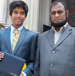 Mohammed Jafor with his son Mahtab Shihab at his high school graduation in 2018