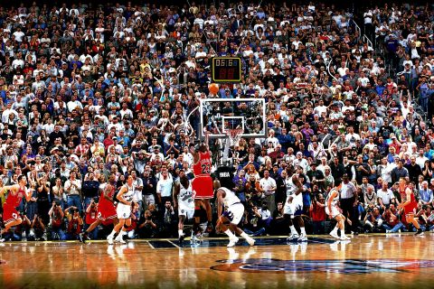Jordan sinks a jumper over Utah's Bryon Russell to win the 1998 NBA Finals. It was his final shot with the Bulls.