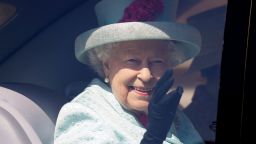 Britain's Queen Elizabeth II waves from her car after attending the Easter Mattins Service at St. George's Chapel, Windsor Castle on her birthday, April 21, 2019.
