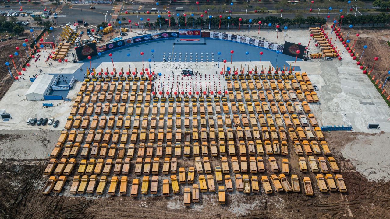 An aerial photo of trucks gathered at the ground-breaking ceremony of Guangzhou Evergrande's new stadium.