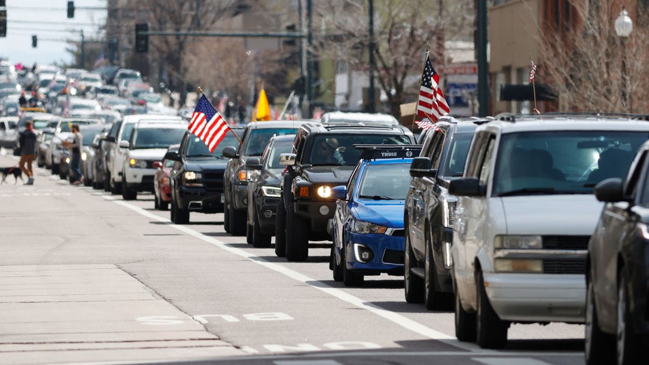 Vehicles stack up in Denver during an April 19 protest against the state's stay-at-home order.