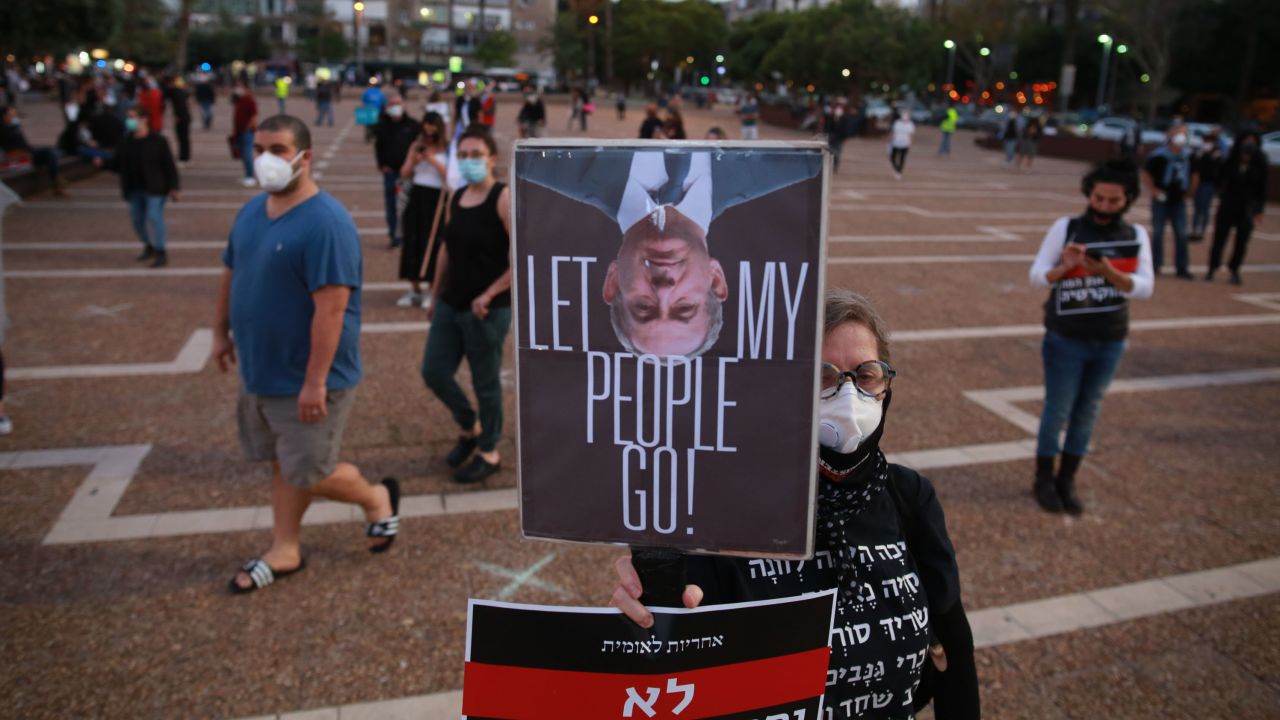Israelis protest at Rabin Square in Tel Aviv on Sunday.