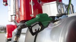 A filler nozzle pumps fuel into the gas tank of a tractor trailer at a Phillips 66 gas station in Princeton, Illinois, U.S., on Wednesday, April 1, 2020. Even with the combination of some Canadian pullback, stripper wells going offline and announced shale cuts, that may not be enough to stop oil prices from going lower as demand craters and supply from OPEC means major increases in stockpiles in the second quarter. Photographer: Daniel Acker/Bloomberg via Getty Images