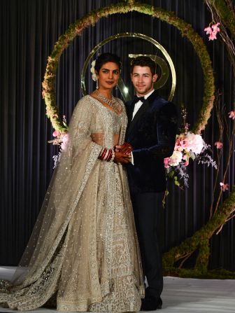 Chopra and American singer Nick Jonas hosted an extravagant concert for their star-studded wedding guests. She wore an elaborate beaded lehenga that took 80 craftsmen 12,000 hours to make.