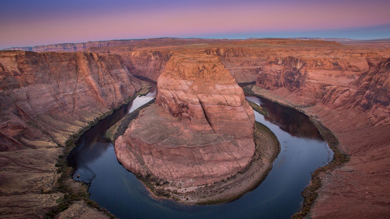 <a href="https://www.cnn.com/2020/02/21/weather/colorado-river-flow-dwindling-warming-temperatures-climate-change/index.html" target="_blank">Colorado River</a><br />The Colorado River is picturesque, but it also provides water to more than 40 million people, from Denver to Los Angeles. However, its flow has dwindled by 20% compared to the last century, and researchers say the climate crisis is to blame. More than half of the decline in the river's flow is connected to increasing temperatures. As warming continues, they say the risk of "severe water shortages" for the millions that rely on it is expected to grow.