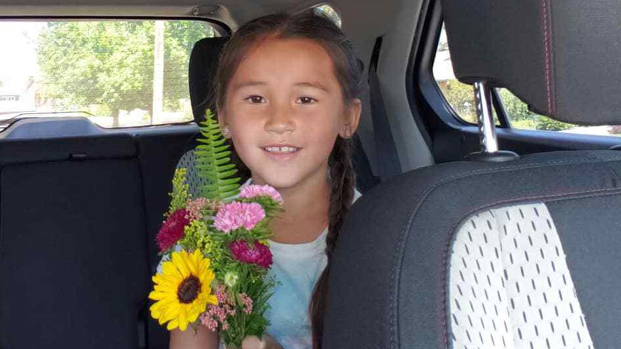 Mieka holding a bouquet from Roxie's Flower Truck she was about to drop off.