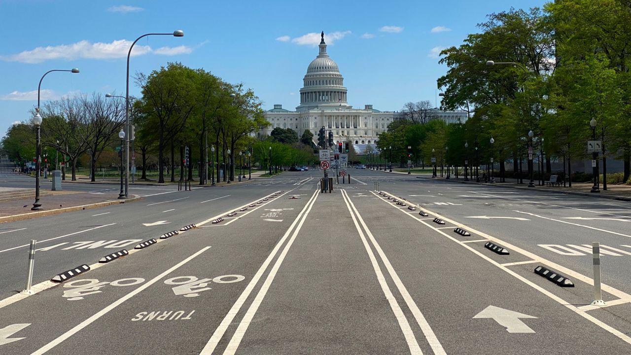 Empty Pennsylvania Avenue with the US Capitol is seen amid the coronavirus pandemic on April 15, 2020 as stay at home order has been extended in Washington, DC - Global stocks sank Wednesday as COVID-19 infects the global economic outlook, while oil prices slumped as OPEC-led output cuts were deemed insufficient to soak up a supply glut. (Photo by Daniel Slim/AFP/Getty Images)