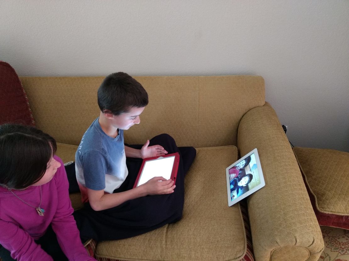 Two of Rachel Lubchansky's triplets chat with cousins online.