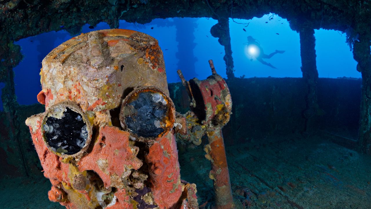 Machinery is seen inside the bridge of the Nippo Maru shipwreck, one of the famous dive sites in this Graveyard of the Pacific.