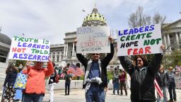 People take part in a "reopen" Pennsylvania demonstration on April 20, 2020 in Harrisburg, Pennsylvania.