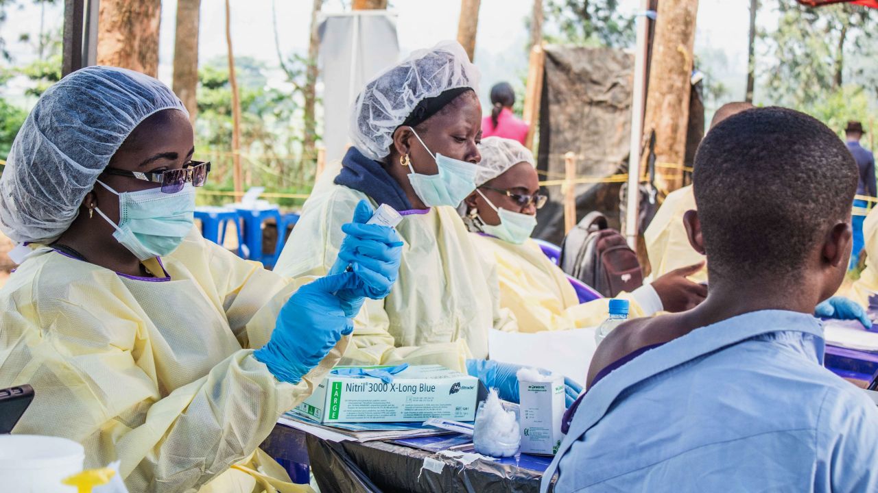 A healthcare worker inoculates a man for Ebola suspicion to take precautions against the disease in Butembo, Democratic Republic of the Congo on July 27, 2019. 