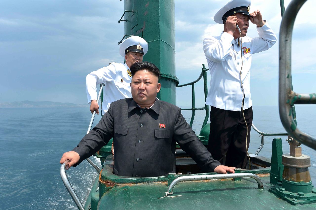 Kim inspects a submarine in this undated photo released by North Korea's state-run news agency in June 2014.