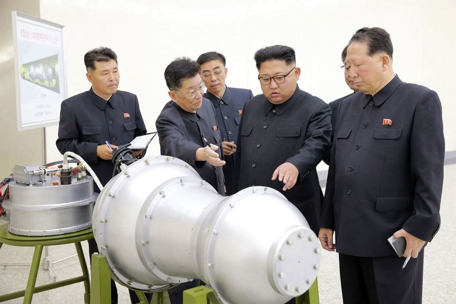 Kim looks at a metal casing in this photo provided by North Korea's state-run news agency in September 2017. Earlier that year, <a href="https://www.cnn.com/2017/01/01/asia/north-korea-kim-jong-un-speech/index.html" target="_blank">in a televised address,</a> Kim claimed that North Korea was close to testing an intercontinental ballistic missile.