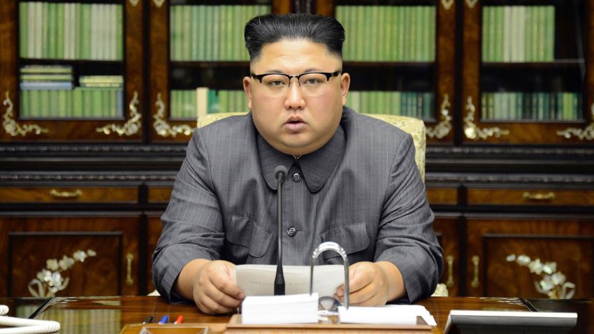 TOPSHOT - This picture taken on September 21, 2017 and released from North Korea's official Korean Central News Agency (KCNA) on September 22 shows North Korean leader Kim Jong-Un delivering a statement in Pyongyan as regards to a speech made by the president of the United States of America at the UN General Assembly.US President Donald Trump is "mentally deranged" and will "pay dearly" for his threat to destroy North Korea, Kim Jong-Un said, in an unprecedented personal attack published hours after Washington vowed tougher sanctions over Pyongyang's nuclear programme. / AFP PHOTO / KCNA VIA KNS / STR / South Korea OUT / REPUBLIC OF KOREA OUT   ---EDITORS NOTE--- RESTRICTED TO EDITORIAL USE - MANDATORY CREDIT "AFP PHOTO/KCNA VIA KNS" - NO MARKETING NO ADVERTISING CAMPAIGNS - DISTRIBUTED AS A SERVICE TO CLIENTSTHIS PICTURE WAS MADE AVAILABLE BY A THIRD PARTY. AFP CAN NOT INDEPENDENTLY VERIFY THE AUTHENTICITY, LOCATION, DATE AND CONTENT OF THIS IMAGE. THIS PHOTO IS DISTRIBUTED EXACTLY AS RECEIVED BY AFP.  /          (Photo credit should read STR/AFP via Getty Images)