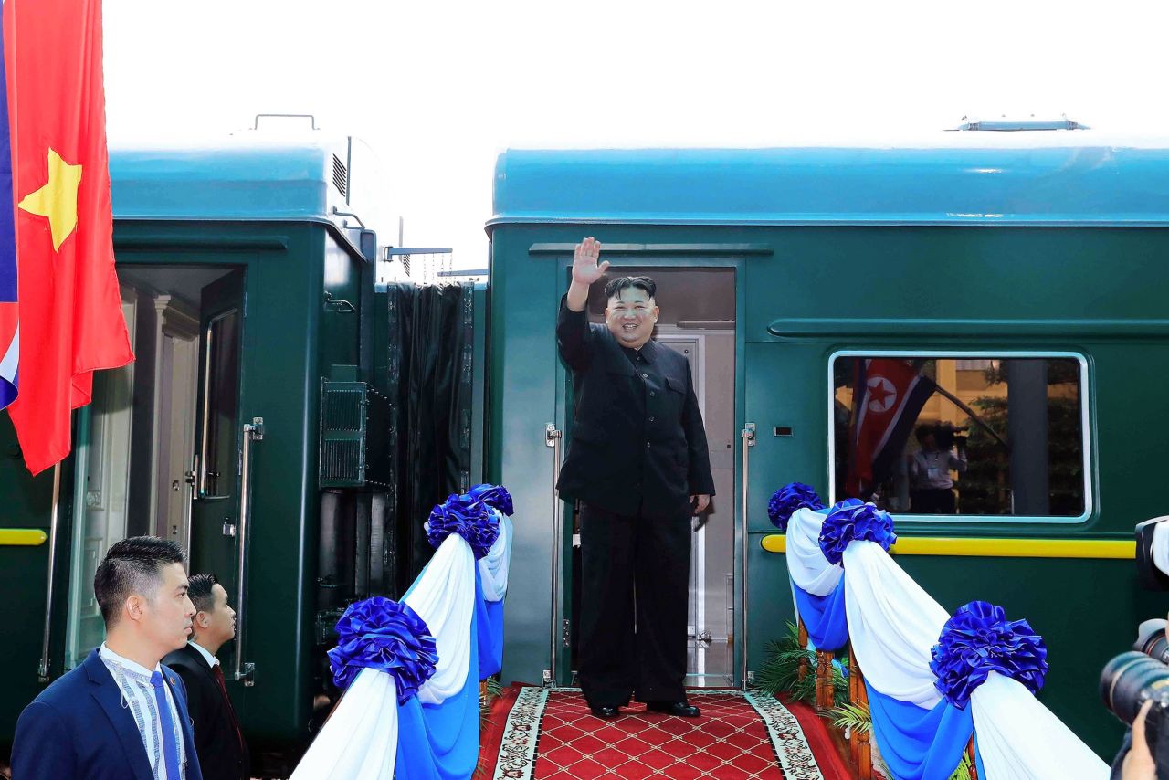 Kim waves before boarding a train in Lang Son, Vietnam, in March 2019.