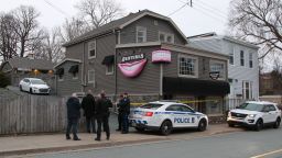 HALIFAX, CANADA - APRIL 20: Regional police investigators confer outside the Atlantic Denture Clinic April 20, 2020 in Dartmouth, Nova Scotia ,Canada. The clinic was owned by the gunman, Gabrielle Wortman, who police say is responsible for Sundays killing spree that resulted in the death of 19, including Wortman. The rampage began late Saturday night in Portapique as well as several other rural communities in the Maritime province. (Photo by Tim Krochak/Getty Images)
