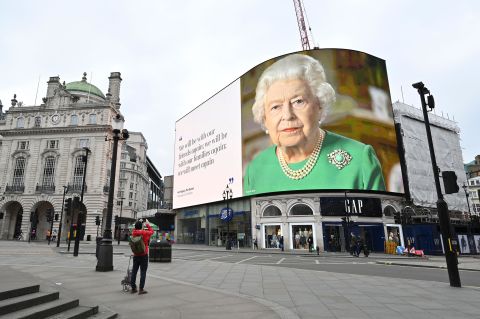 An image of the Queen appears in London's Piccadilly Square, alongside a message of hope from her <a href="https://edition.cnn.com/2020/04/05/uk/queen-elizabeth-ii-coronavirus-address-gbr-intl/index.html" target="_blank">special address to the nation</a> in April 2020.