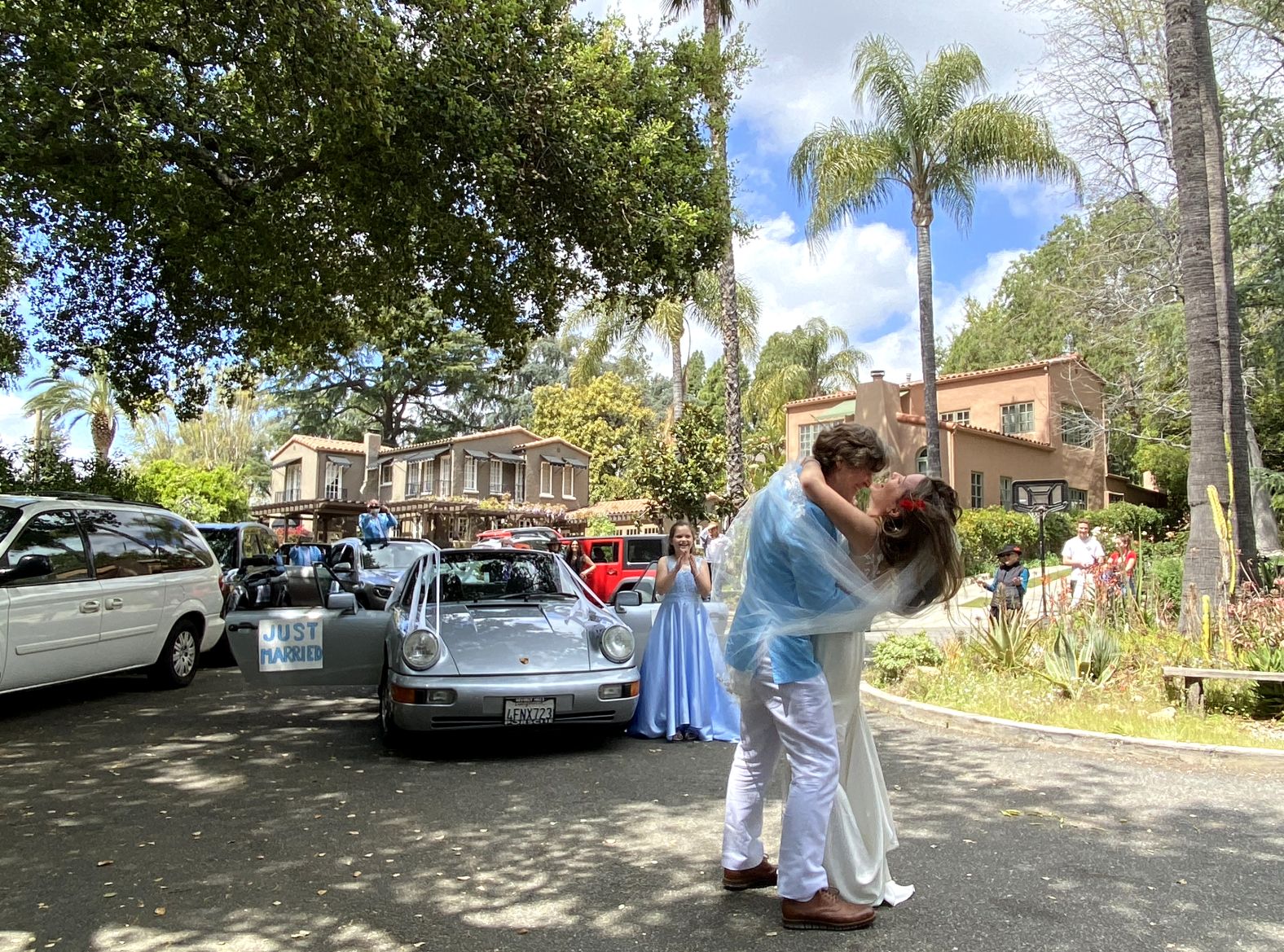 Martin Garret and Dr. Brecken Armstrong, an emergency-room physician, embrace after being married in a small ceremony in Altadena, California, on April 4. The couple were supposed to get married in Greece, but their plans changed because of the pandemic.