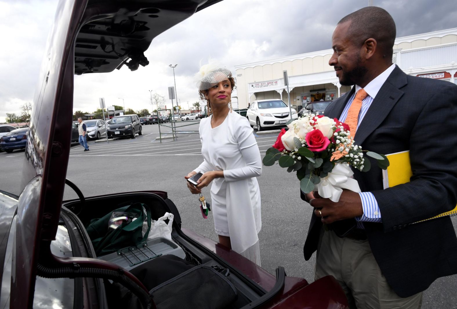 Katira Shores and Rashaun Sourles prepare to be married at the Beyond Services notary in Alhambra, California, on March 19. Shores and Sourles, who live in San Diego, were supposed to be married in Reno, Nevada, in April. Their wedding was canceled, and after a long search from San Diego to Los Angeles, they eventually found a notary service in Alhambra that could perform the service.