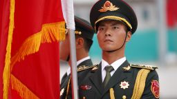 BEIJING, CHINA - SEPTEMBER 11: A soldier holds a flag and stands in preparation for the welcoming ceremony of the meeting between Chinese President Xi Jinping and Kazakh President Kassym Jomart Tokayev (not pictured) on September 11, 2019 at the Great Hall of the People, Beijing, China. (Photo by Andrea Verdelli/Getty Images)