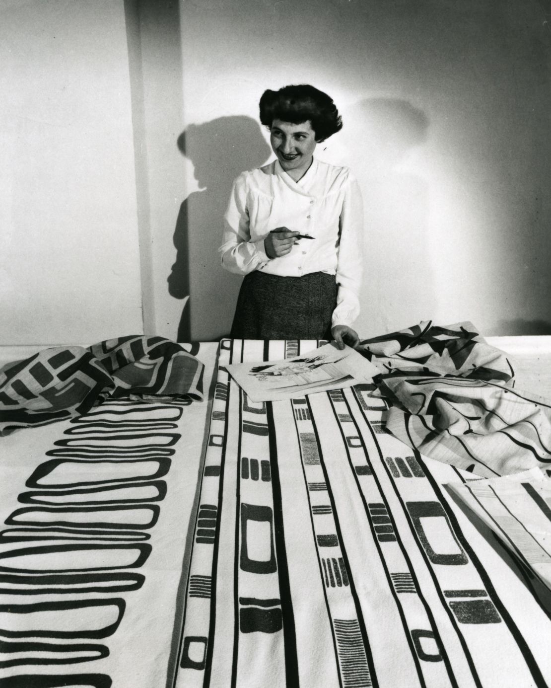 Ruth Adler Schnee working with designs for Slits and Slats and Pits and Pods.