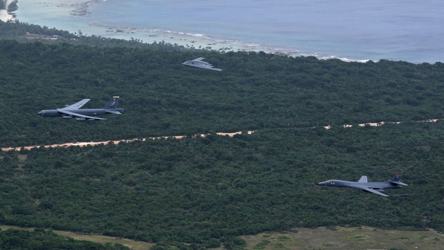 A US Air Force B-52 Stratofortress, B-1 Lancer and B-2 Spirit fly over Guam after launching from Andersen Air Force Base, Guam, for an integrated bomber operation Aug.17, 2016.