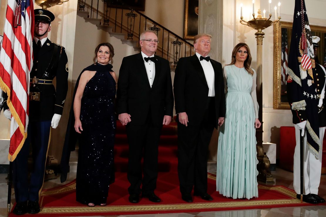 US President Donald Trump and first lady Melania Trump pose for photos with Australian Prime Minister Scott Morrison and his wife, Jenny Morrison, ahead of a state dinner at the White House.