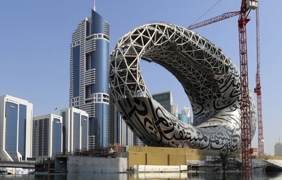 Dubai's <a href="https://edition.cnn.com/travel/article/dubai-museum-of-the-future-intl/index.html" target="_blank">Museum Of The Future</a>, pictured under construction on October 2, 2019. The museum features a void in the center of its torus shape -- symbolic of "what is not yet known," according to its architects, <a href="https://www.killadesign.com/portfolio/museum-of-the-future/" target="_blank" target="_blank">Killa Design</a>. They used computer-controlled machining tools to cut more than 1,000 molds that support the fiberglass and stainless steel system on the facade.