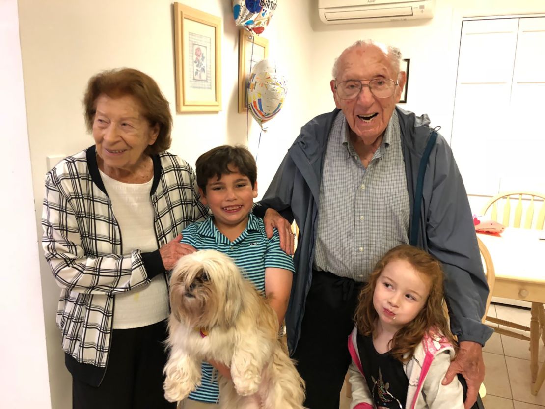 Philip Kahn with his late wife, Rose Kahn, and two of their great grandchildren.