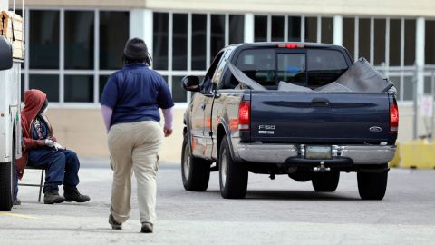 The pickup truck arrives, with bodies under the mats in the cargo bed, at a space near the Joseph W. Spellman Medical Examiner Building in University City on April 19