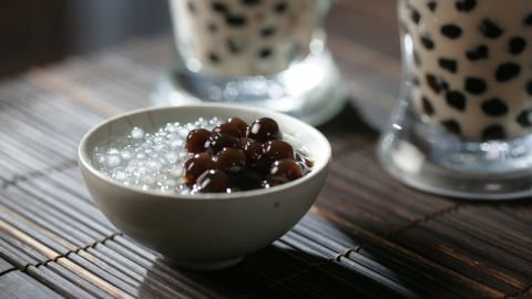 The white fenyuan, tapioca balls, were first used to make bubble tea. The larger black balls appeared later.