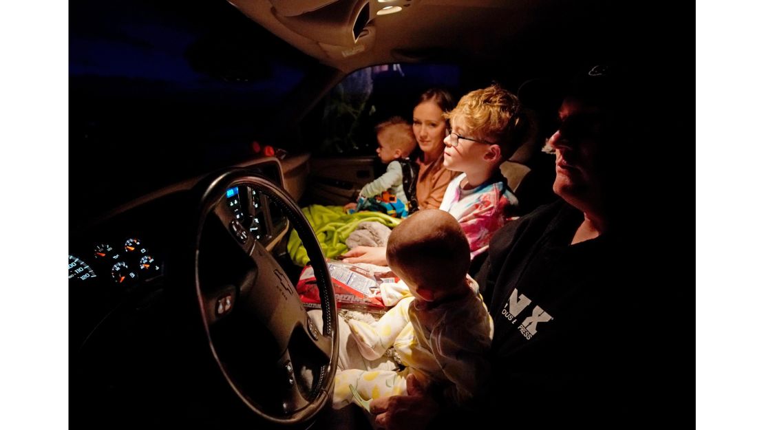 A family watches  "Onward" at the Basin Drive In on March 27 in Mount Pleasant, Utah. 