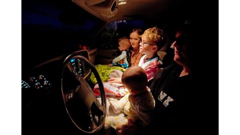 A family watches  "Onward" at the Basin Drive In on March 27 in Mount Pleasant, Utah. 
