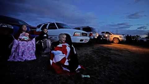 Kids watch a movie at the Basin Drive In on March 27 in Mount Pleasant, Utah. The Basin Drive stayed open despite  the coronavirus pandemic. 