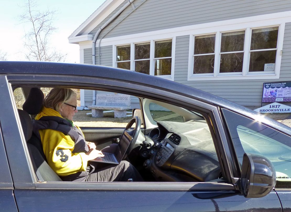 Beatrix Gates must park outside the town offices in her Maine hometown to access their WiFi.